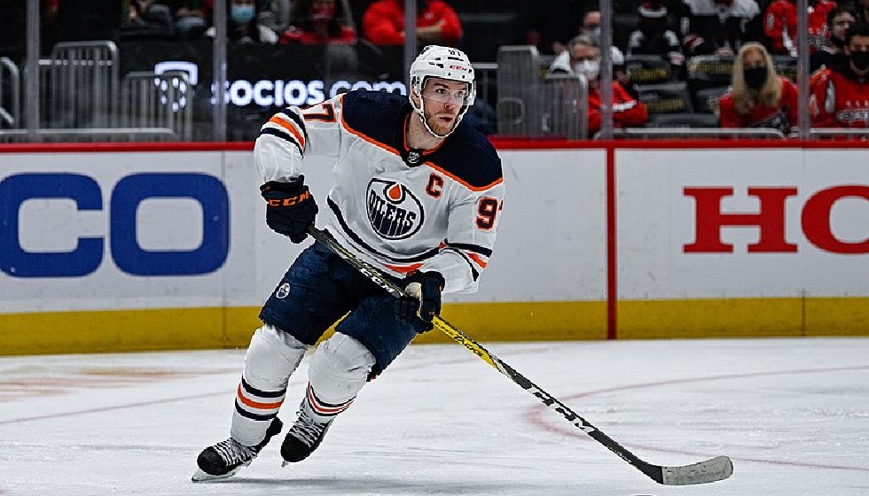 Edmonton Oilers celebrate securing a playoff berth after a successful season turnaround.